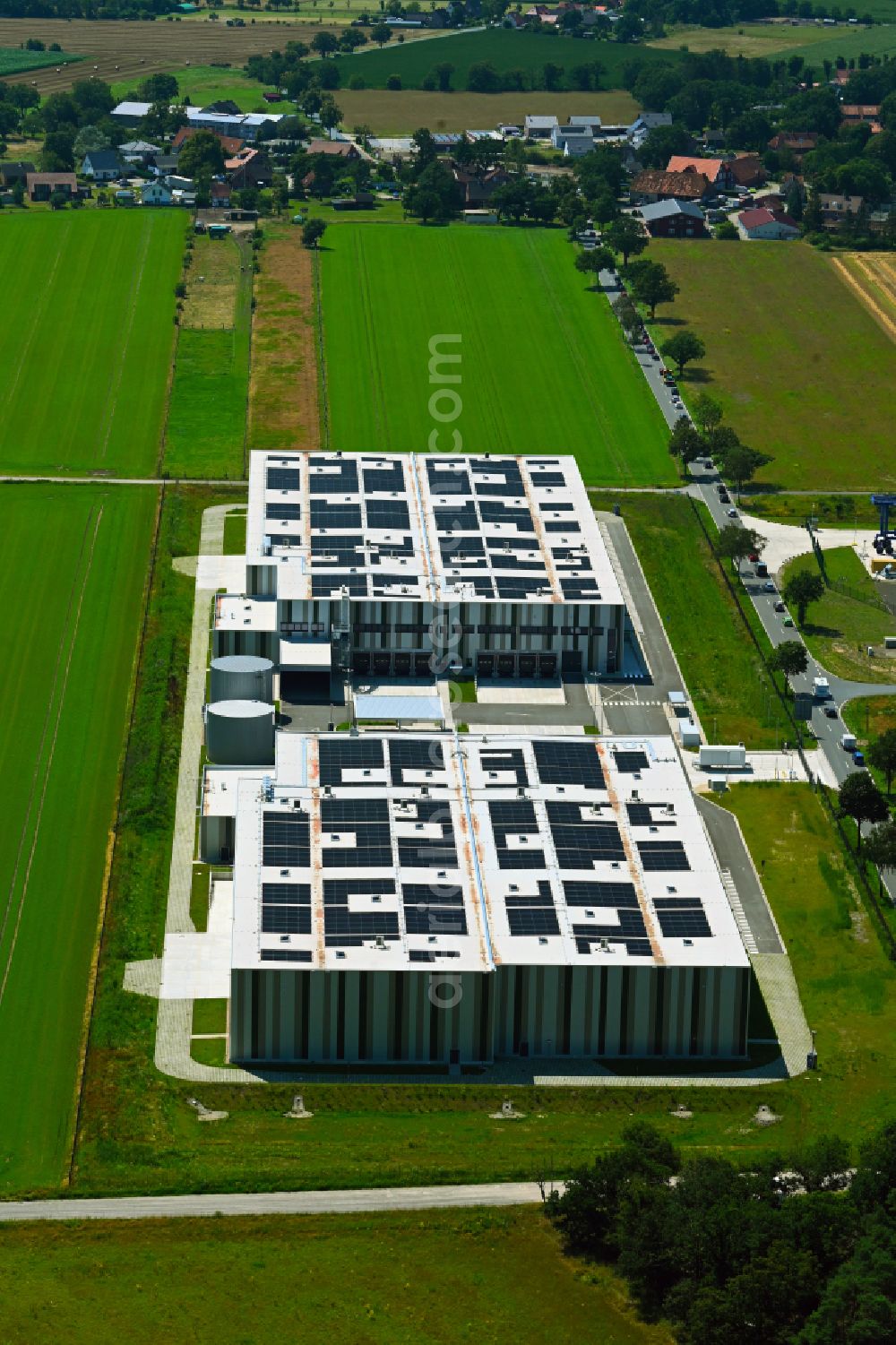 Berkhof from above - Warehouses and forwarding building REWE Group Fruchtlogistik on street Wieckenberger Strasse in Berkhof in the state Lower Saxony, Germany