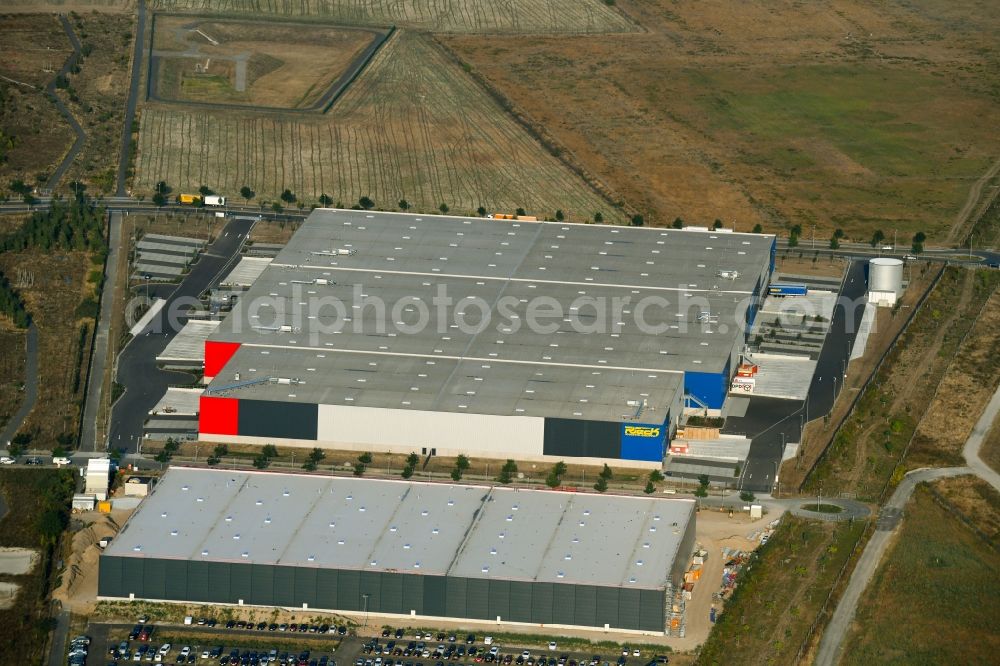 Berlin from above - Warehouses and forwarding building Rieck Fulfillment Solutions GmbH & Co. KG on Alexander-Meissner-Strasse in the district Bohnsdorf in Berlin, Germany