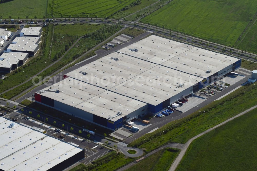 Berlin from the bird's eye view: Warehouses and forwarding building Rieck Fulfillment Solutions GmbH & Co. KG on Alexander-Meissner-Strasse in the district Bohnsdorf in Berlin, Germany