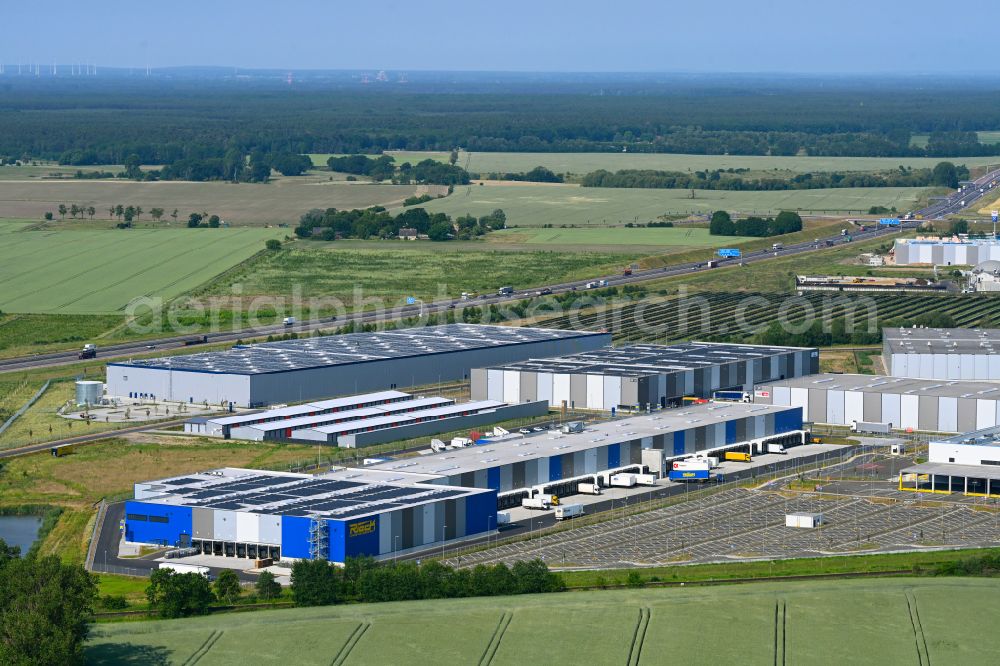 Aerial photograph Oberkrämer - Warehouses and forwarding building Rieck Logistik Berlin Nord GmbH & Co. KG on street Im Gewerbepark in Oberkraemer in the state Brandenburg, Germany