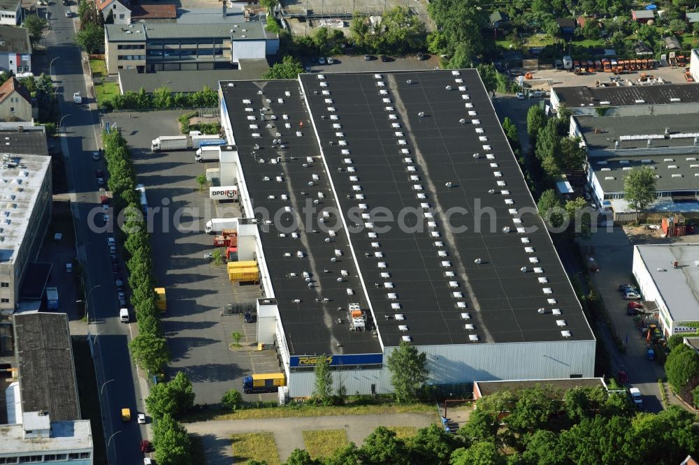 Aerial image Berlin - Warehouses and forwarding building Rieck Projekt Kontrakt Logistik Berlin GmbH & Co. KG on Porschestrasse in the district Mariendorf in Berlin, Germany