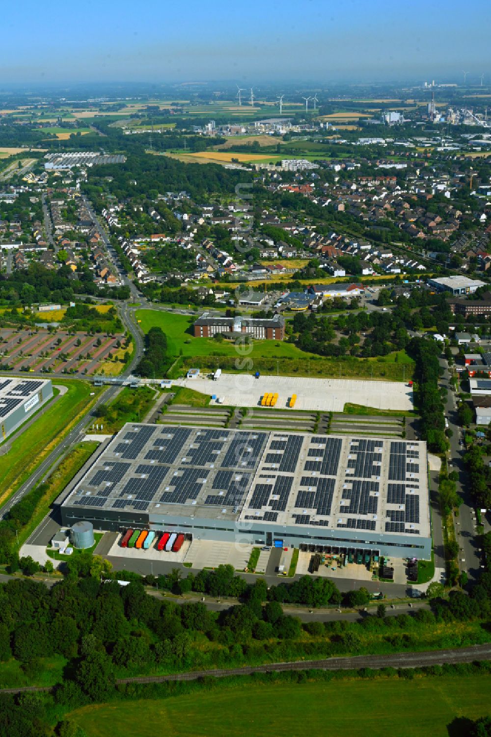 Aerial image Rheinberg - Warehouses and forwarding building of Rudolph Logistik Gruppe on street Alte Landstrasse in the district Winterswick in Rheinberg in the state North Rhine-Westphalia, Germany