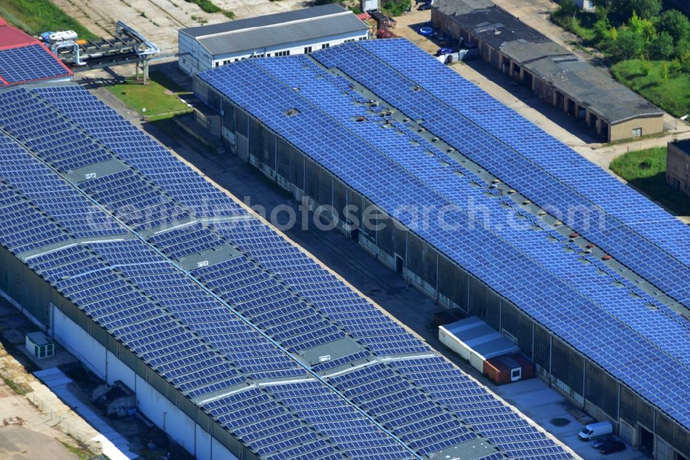 Bernau from the bird's eye view: View to Warehouse complex of the former GDR State Reserve on Schoenfelder way in Bernau in the state of Brandenburg