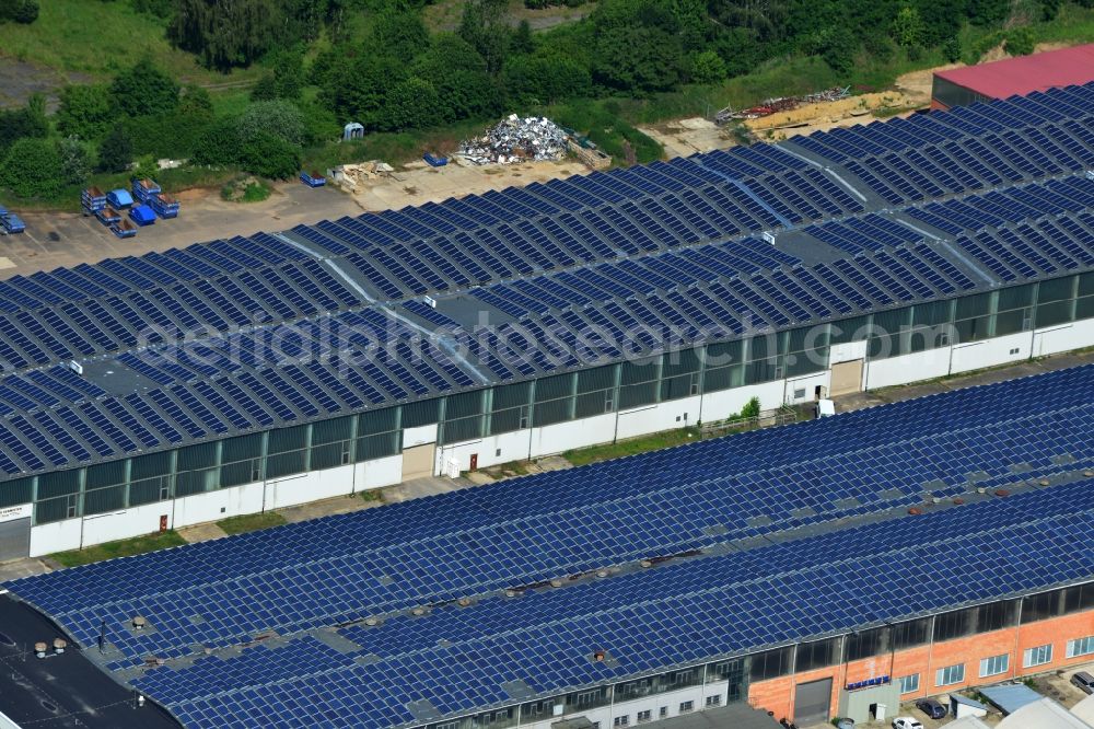 Aerial image Bernau - View to Warehouse complex of the former GDR State Reserve on Schoenfelder way in Bernau in the state of Brandenburg