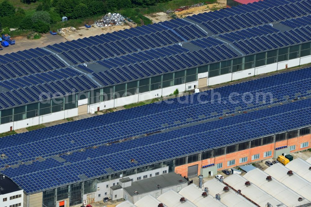 Aerial photograph Bernau - View to Warehouse complex of the former GDR State Reserve on Schoenfelder way in Bernau in the state of Brandenburg