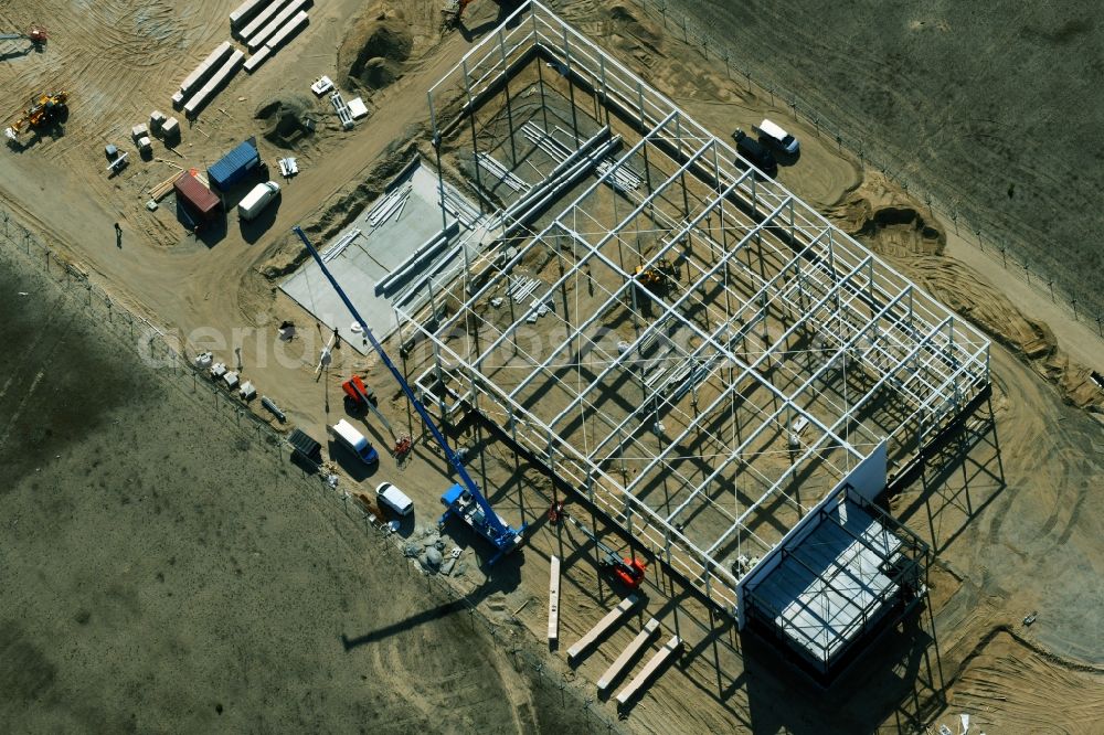 Hennigsdorf from the bird's eye view: Warehouse complex building new construction in the industrial area on the factory street in Hennigsdorf in the state Brandenburg, Germany