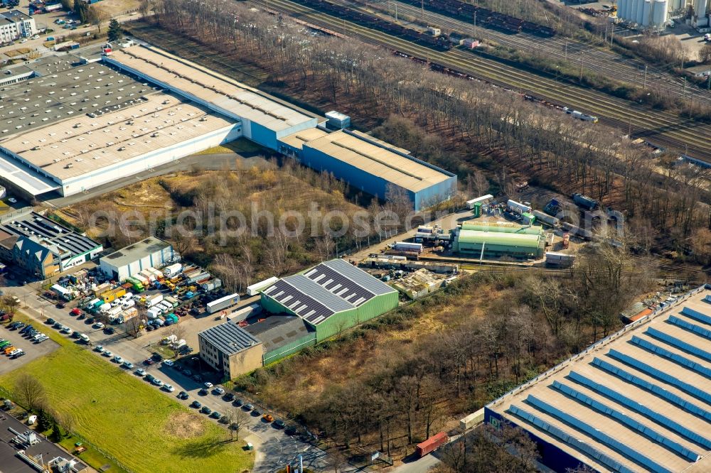 Bottrop from above - Warehouse complex-building of the AStrans Waggon and Transport GmbH in the commercial and industrial area on the Knipp castle in Bottrop in North Rhine-Westphalia