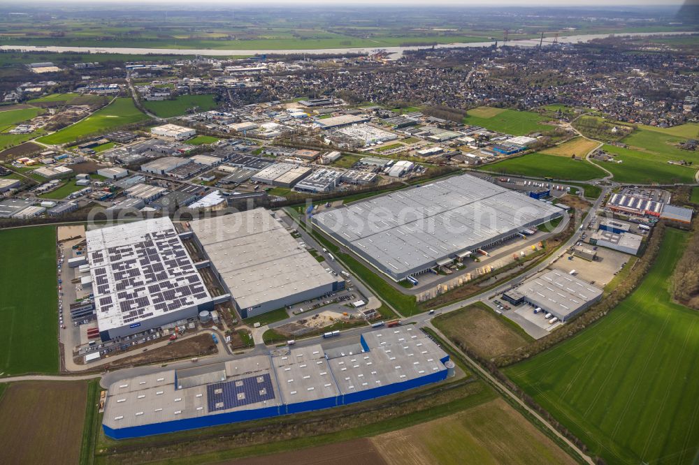 Emmerich am Rhein from above - Warehouse complex-building in the industrial area BLG Handelslogistik GmbH & Co.KG in the district Huethum in Emmerich am Rhein in the state North Rhine-Westphalia, Germany