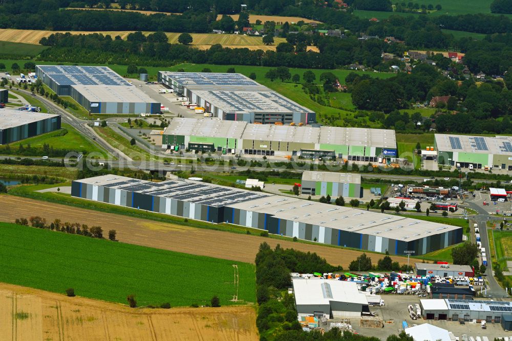 Aerial photograph Mienenbüttel - Warehouse complex-building in the industrial area on street BAB Autobahn A1 - Schlepelsberg in Mienenbuettel in the state Lower Saxony, Germany