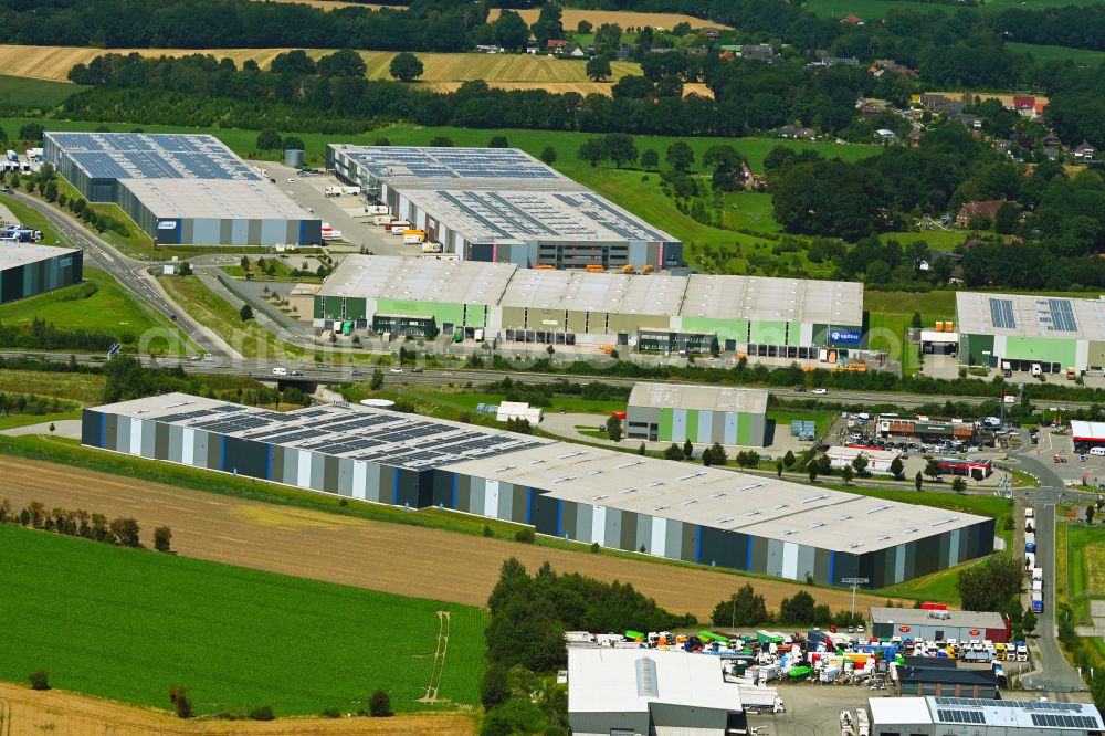 Aerial image Mienenbüttel - Warehouse complex-building in the industrial area on street BAB Autobahn A1 - Schlepelsberg in Mienenbuettel in the state Lower Saxony, Germany