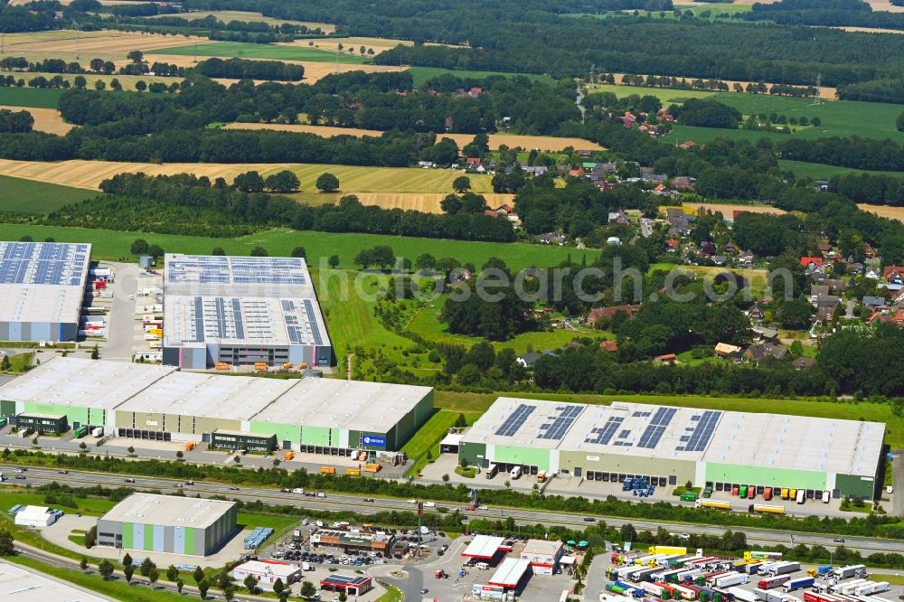 Aerial image Mienenbüttel - Warehouse complex-building in the industrial area on street BAB Autobahn A1 - Schlepelsberg in Mienenbuettel in the state Lower Saxony, Germany