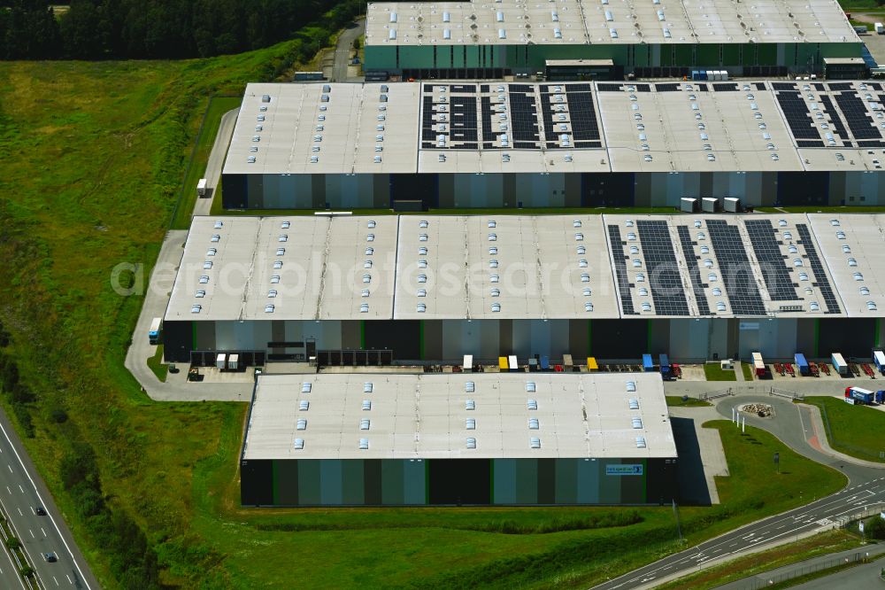 Aerial image Mienenbüttel - Warehouse complex-building in the industrial area on street BAB Autobahn A1 - Schlepelsberg in Mienenbuettel in the state Lower Saxony, Germany