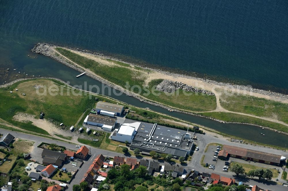 Hasle from the bird's eye view: Warehouse complex-building in the industrial area an der Sondre Baek at Sondre Baek on the shore of the Baltic Sea in Hasle in Region Hovedstaden, Denmark