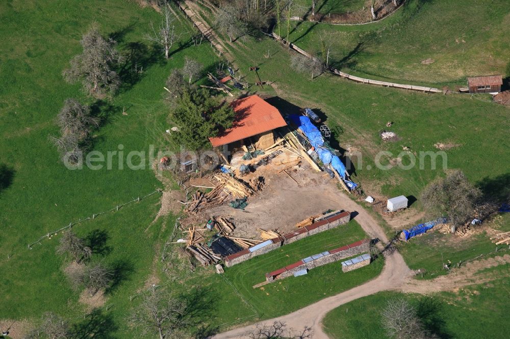 Hasel from above - Shelter for wood and straw on a farm land in Hasel in the state Baden-Wuerttemberg, Germany