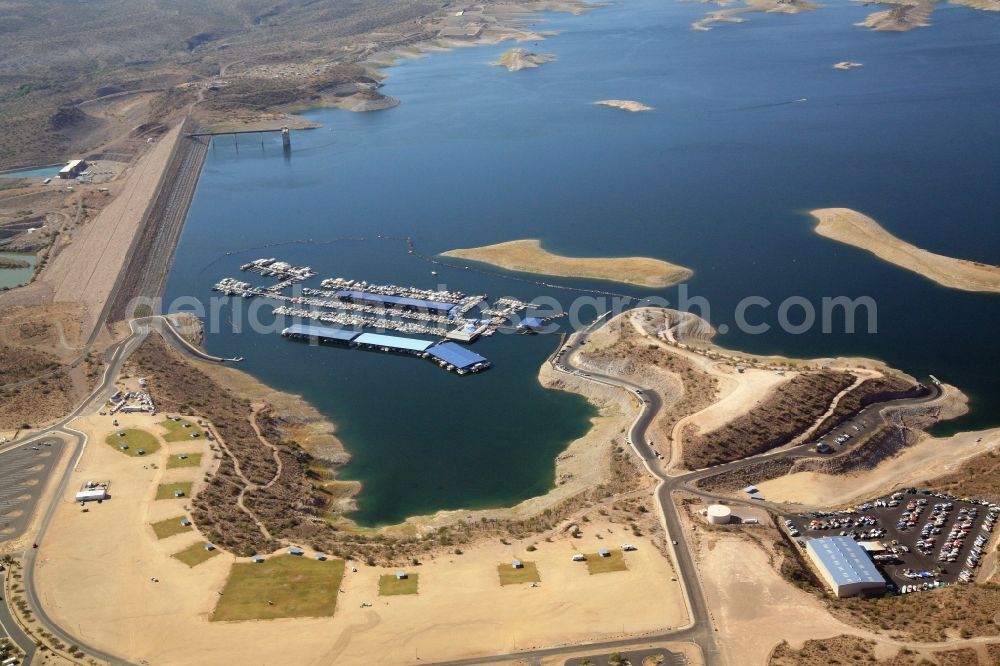 Peoria from the bird's eye view: The Lake Pleasant in Peoria, Arizona in the United States is a recreational area for the Phoenix metropolitan area. Water sports, camping, swimming, bathing and fishing is offered in the desert area north of Pheonix