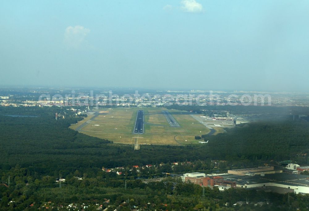 Aerial photograph Berlin - Landing a Cessna 172 on the runway of the airport Tegel in Berlin