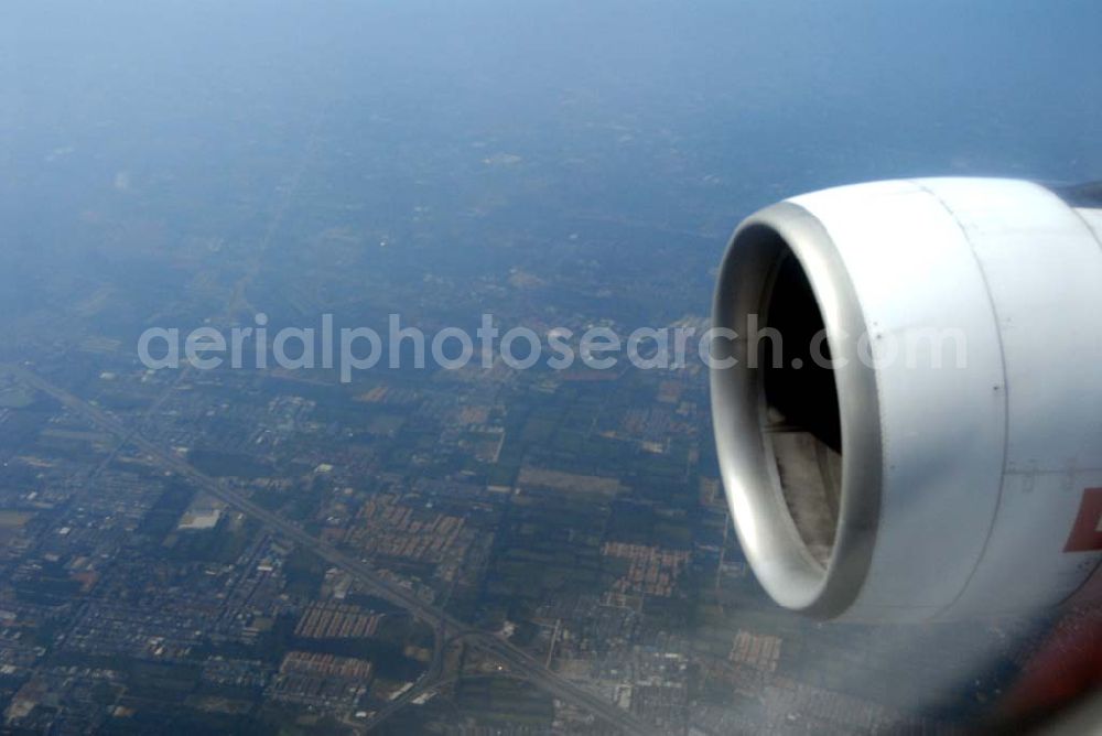 Aerial photograph Bangkok / Thailand - Landeanflug mit einem Airbus A330 der LTU auf dem Flughafen Bangkok International von Norden her über Reisanbaugebiete am Stadtrand