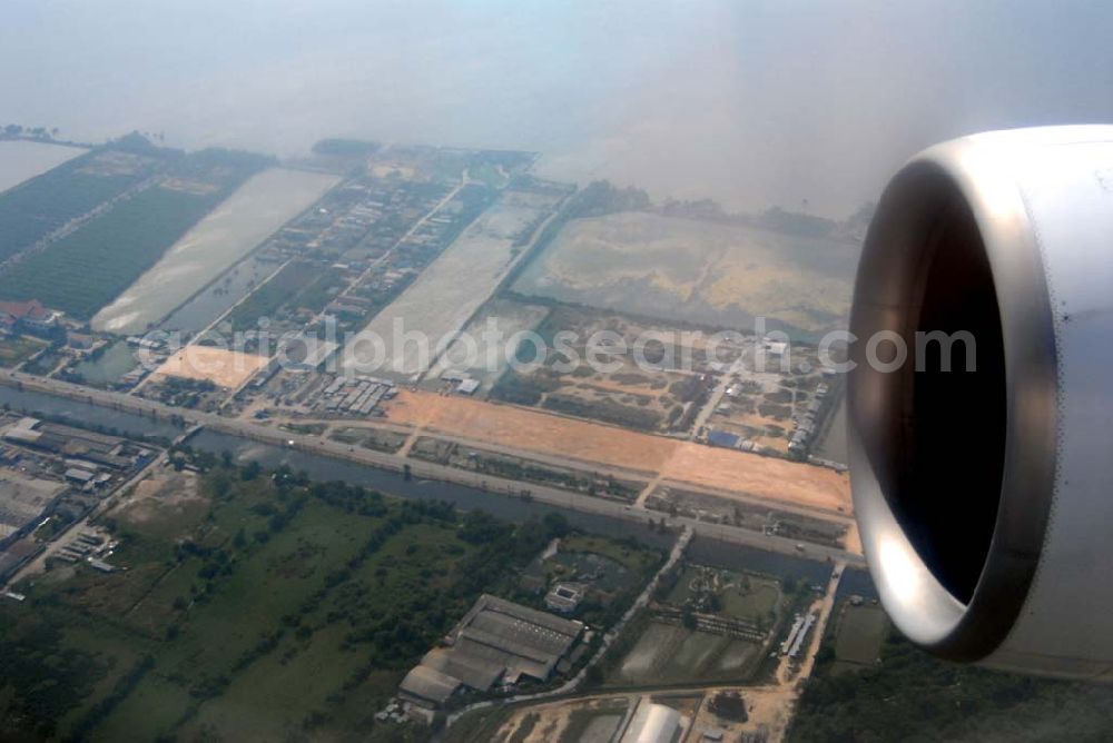 Aerial image Bangkok / Thailand - Landeanflug mit einem Airbus A330 der LTU auf dem Flughafen Bangkok International von Norden her über Reisanbaugebiete am Stadtrand