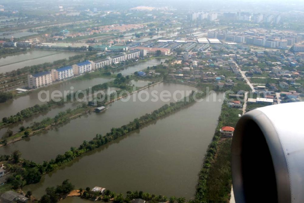 Aerial image Bangkok / Thailand - Landeanflug mit einem Airbus A330 der LTU auf dem Flughafen Bangkok International von Norden her über Reisanbaugebiete am Stadtrand