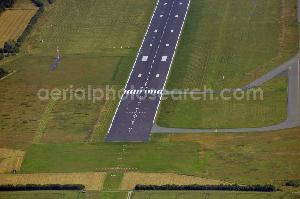 Aerial photograph Dortmund - Runway of Dortmund Airport in the state of North Rhine-Westphalia. The airport is located in the east of Dortmund at the city limits of Holzwickede and Unna. The former public airfield is now the fourth largest commercial airport in North Rhine-Westphalia