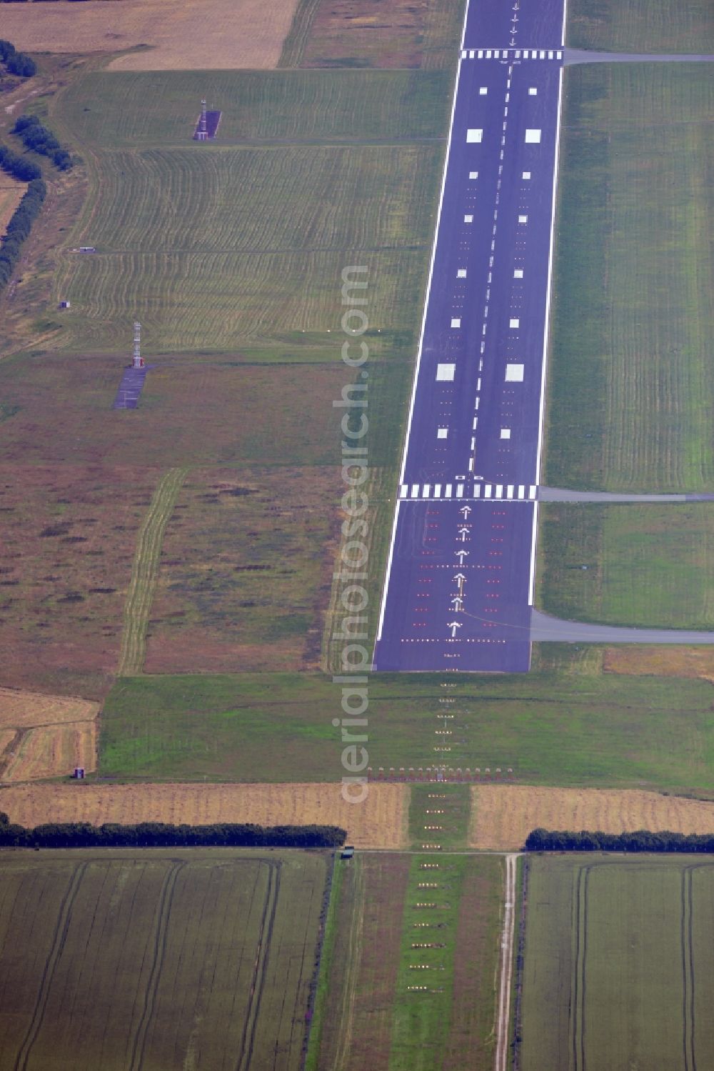 Dortmund from the bird's eye view: Runway of Dortmund Airport in the state of North Rhine-Westphalia. The airport is located in the east of Dortmund at the city limits of Holzwickede and Unna. The former public airfield is now the fourth largest commercial airport in North Rhine-Westphalia