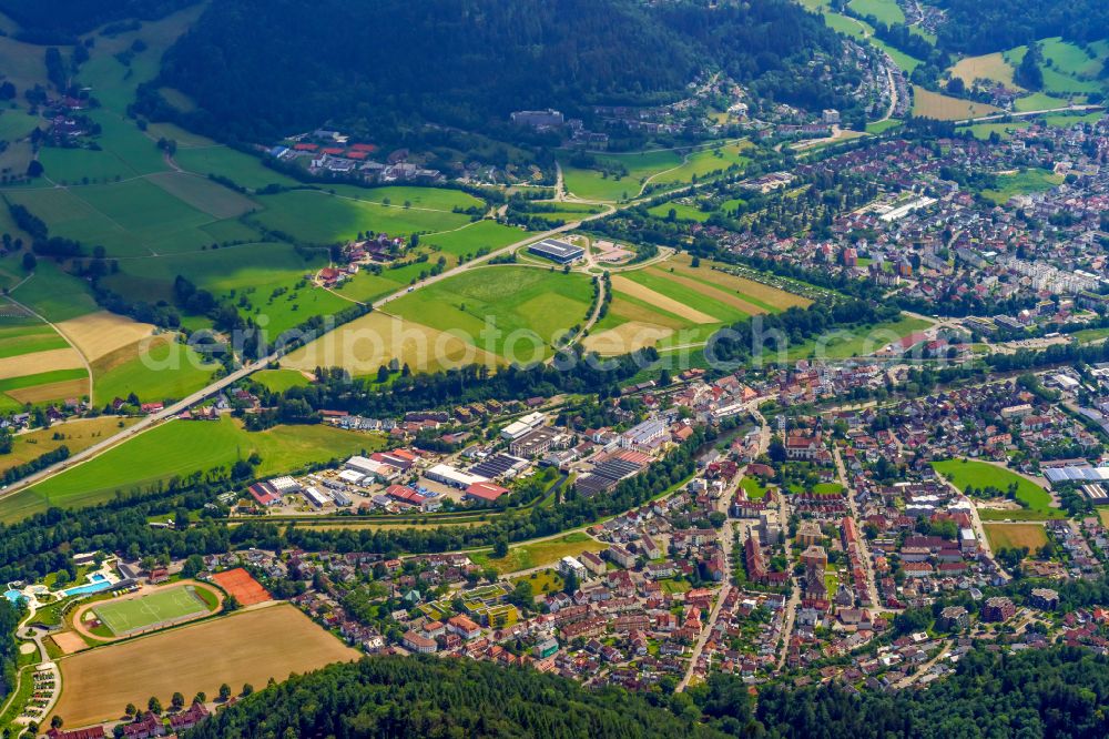 Kollnau from the bird's eye view: Industrial and commercial area on the edge of agricultural fields and fields on street Am Vorwerk in Kollnau in the state Baden-Wuerttemberg, Germany