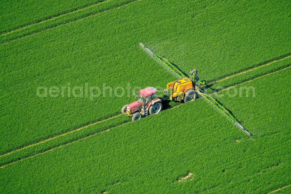 Aerial image Anröchte - Farm equipment used for fertilizing fields in Anroechte in the state North Rhine-Westphalia, Germany