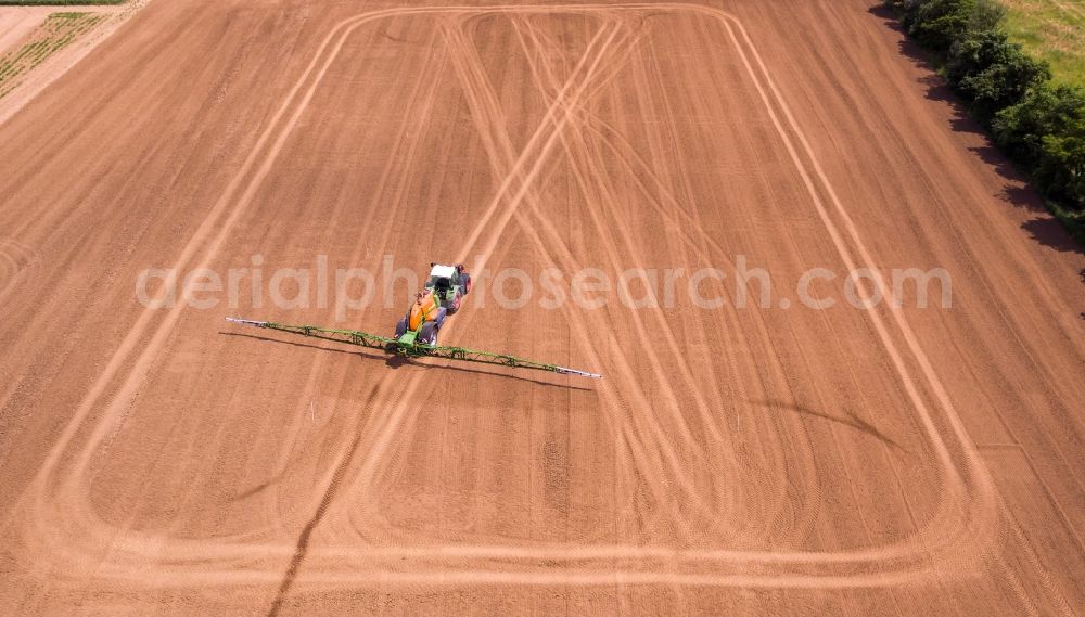 Arzberg from the bird's eye view: Farm equipment used for fertilizing fields in Arzberg in the state Saxony, Germany