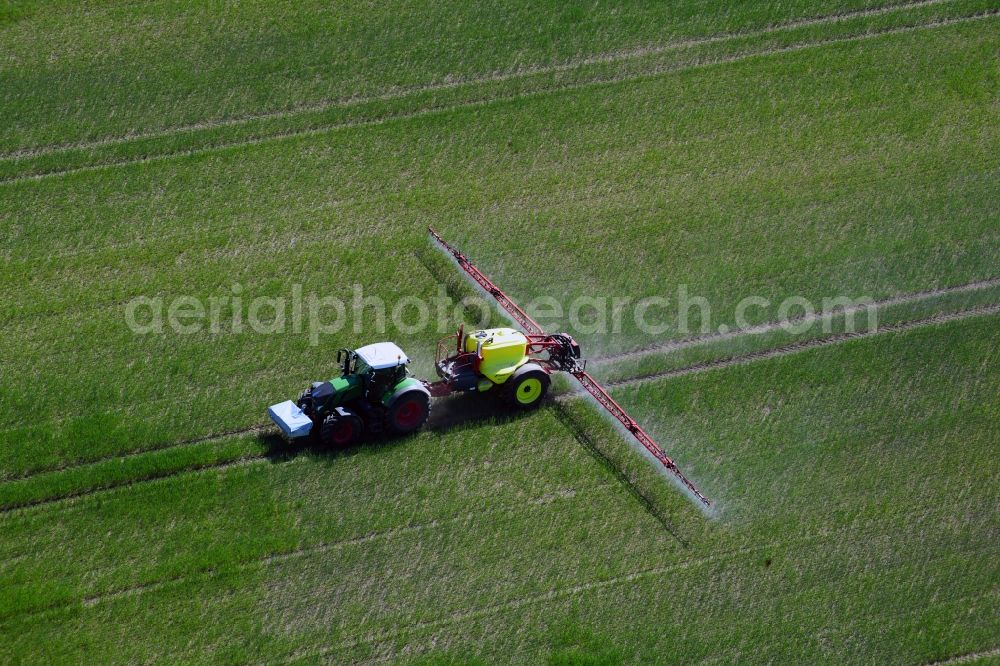 Dolgen from above - Farm equipment used for fertilizing fields in Dolgen in the state Mecklenburg - Western Pomerania, Germany