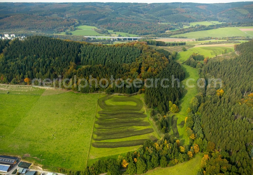 Meschede from above - Farm equipment used for fertilizing fields in Meschede in the state North Rhine-Westphalia