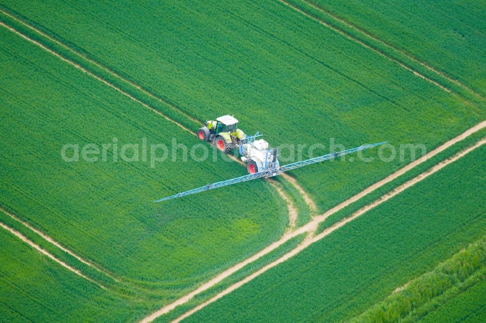 Rosdorf from above - Farm equipment used for fertilizing fields in Rosdorf in the state Lower Saxony, Germany