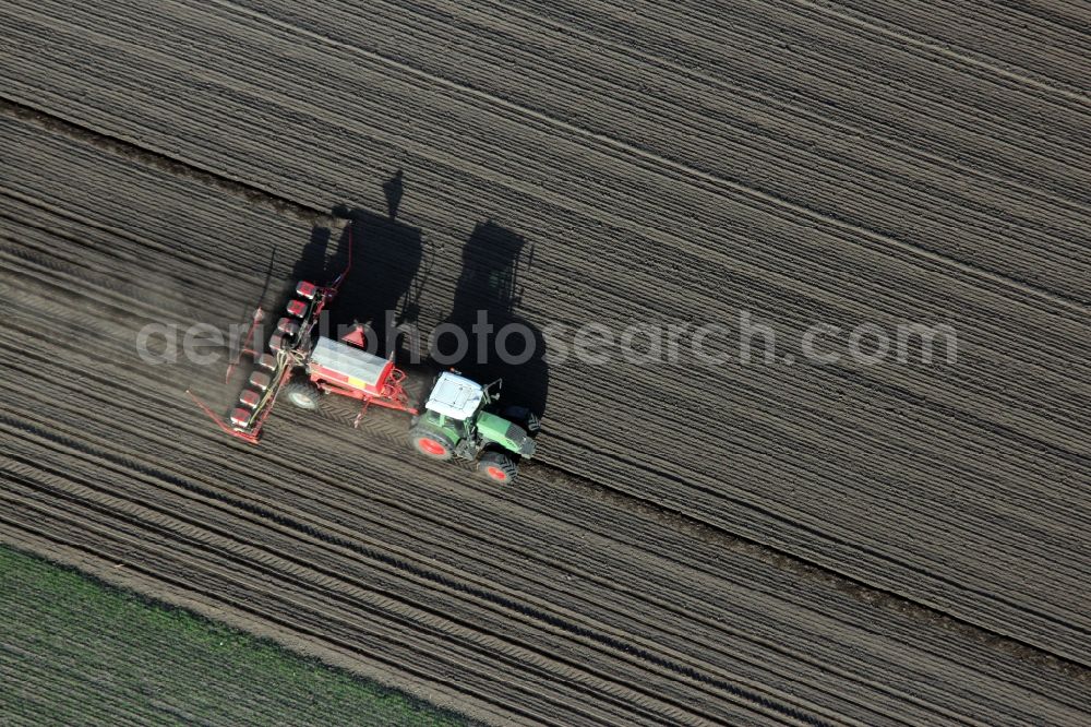 Aerial image Tiergarten - Farm equipment used for fertilizing fields in Tiergarten in the state Brandenburg