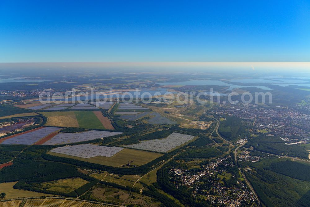 Senftenberg from the bird's eye view: Landscape with fields and forest with a view of the Grossraeschner See near Senftenberg in the state Brandenburg, Germany