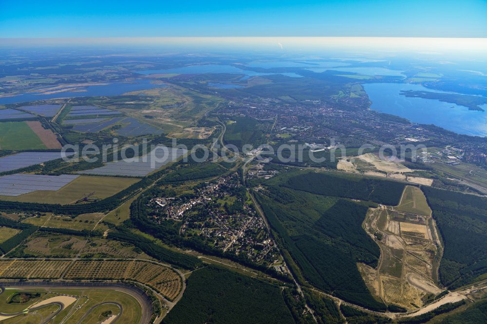 Aerial image Senftenberg - Landscape with fields and forest with a view of the Grossraeschner See near Senftenberg in the state Brandenburg, Germany