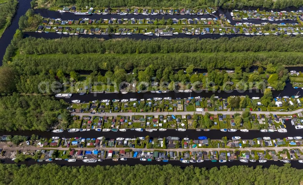 Aerial image Loosdrecht - Landscape with boat houses and docks with bungalow settlement near Loosdrecht in Holland - Netherlands