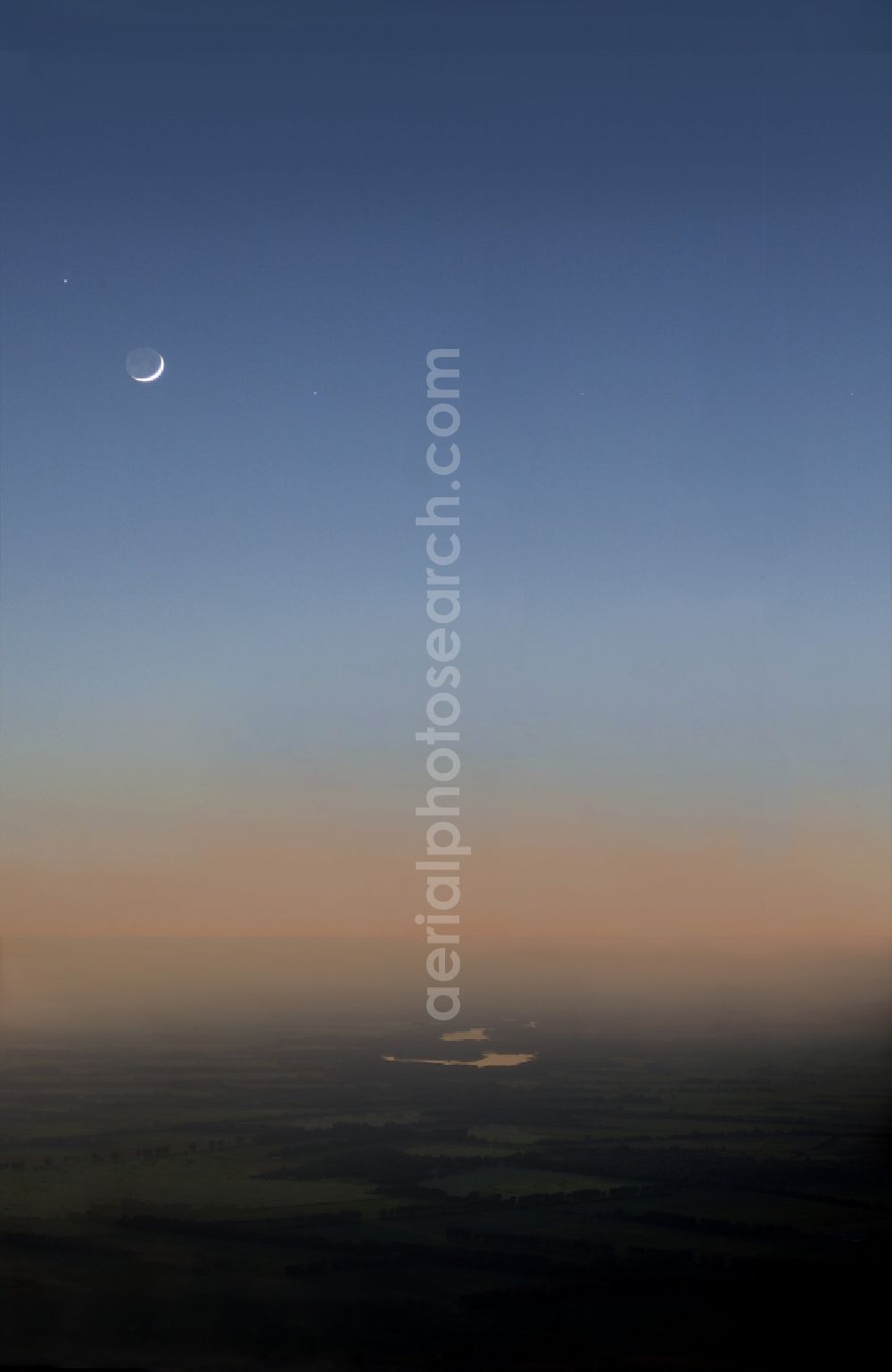 Neuruppin from above - Landscape in sunset, Neuruppin in the state Brandenburg, sky and moon