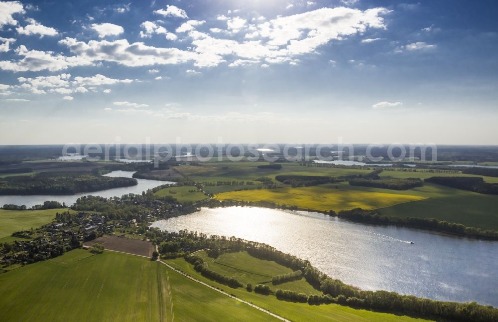 Priepert from above - The landscape, fields and waters in Priepert in the state of Mecklenburg-Western Pomerania. The place is located on the Grosser Priepertsee