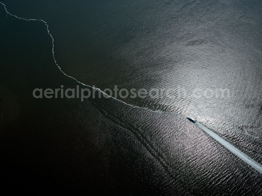 Emden from above - Landscape with boat traffic on the river Ems near Emden in Lower Saxony