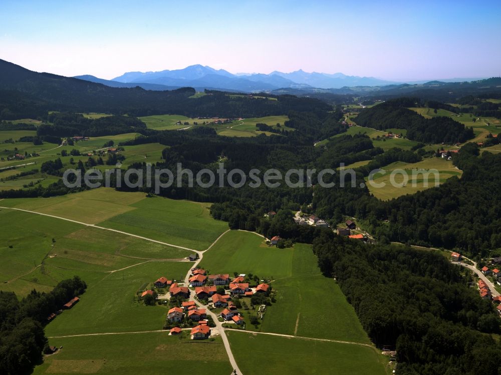 Aerial image Traunstein - Landscape in Traunstein in the state of Bavria. In the surrounding region of Traunstein, there are several small settlements and villages. View from Traunstein to the South where the Alps are located. The landscape is characterised by hills and valleys