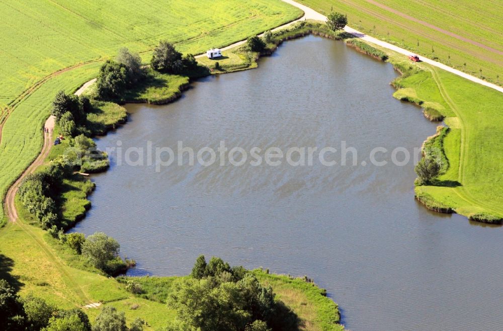 Mühlberg from the bird's eye view: Landscape with little lake shore area at the Castle Leite at Muehlberg of Thuringia