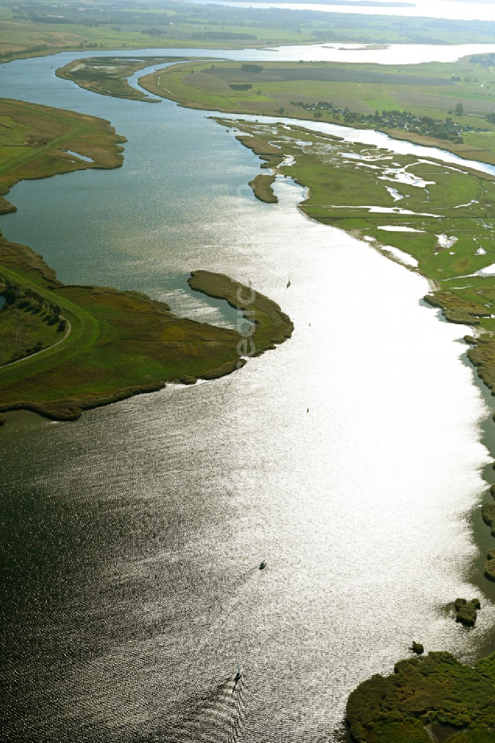 Aerial image Kröslin - Landscape on the banks of the Peenestrom river and the Peenewiesen with a view of the Gross Wotig pond landscape in Kroeslin in the state of Mecklenburg-Western Pomerania