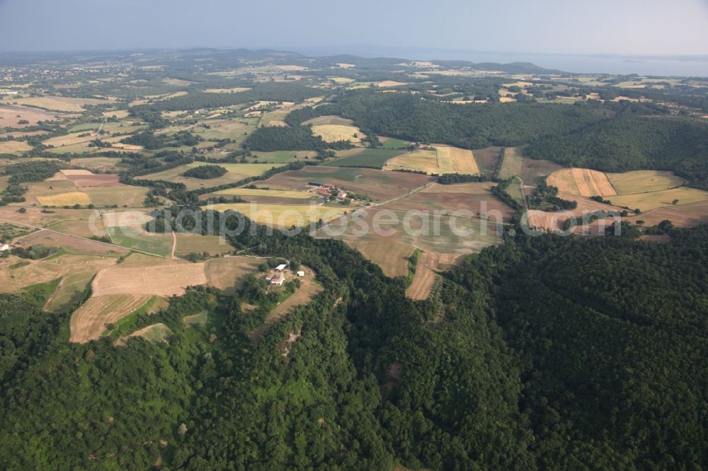 Torre Alfina from above - Landscape with forest land and cultivated fields in Torre Alfina in Lazio in Italy