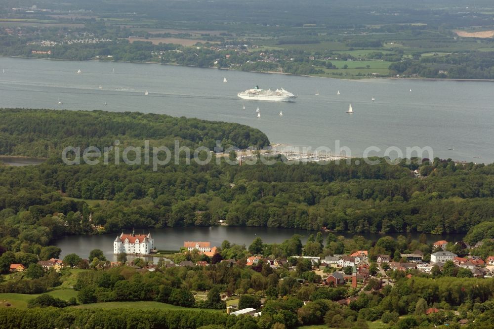 Aerial photograph Glücksburg - Landscape with water castle and woods in Gluecksburg in Schleswig-Holstein