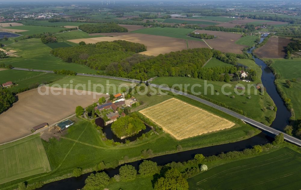 Aerial image Olfen - Landscape of meadows and fields at the Hotel-Restaurant Zur Rauschenburg at Olfen in the state of North Rhine-Westphalia