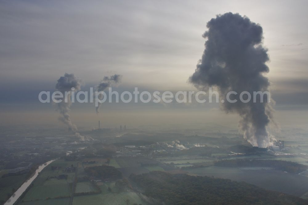 Bergkamen from the bird's eye view: Landscape with cloud at temperature inversion with inversion layer over the coal-fired power plant Bergkamen in North Rhine-Westphalia. The coal-fired power plant on dates-Hamm Canal is operated by RWE