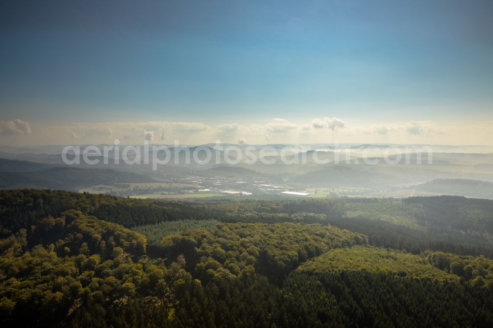 Aerial photograph Enste - Landscape view over the treetops of a wooded area with view of Enste in the state North Rhine-Westphalia, Germany