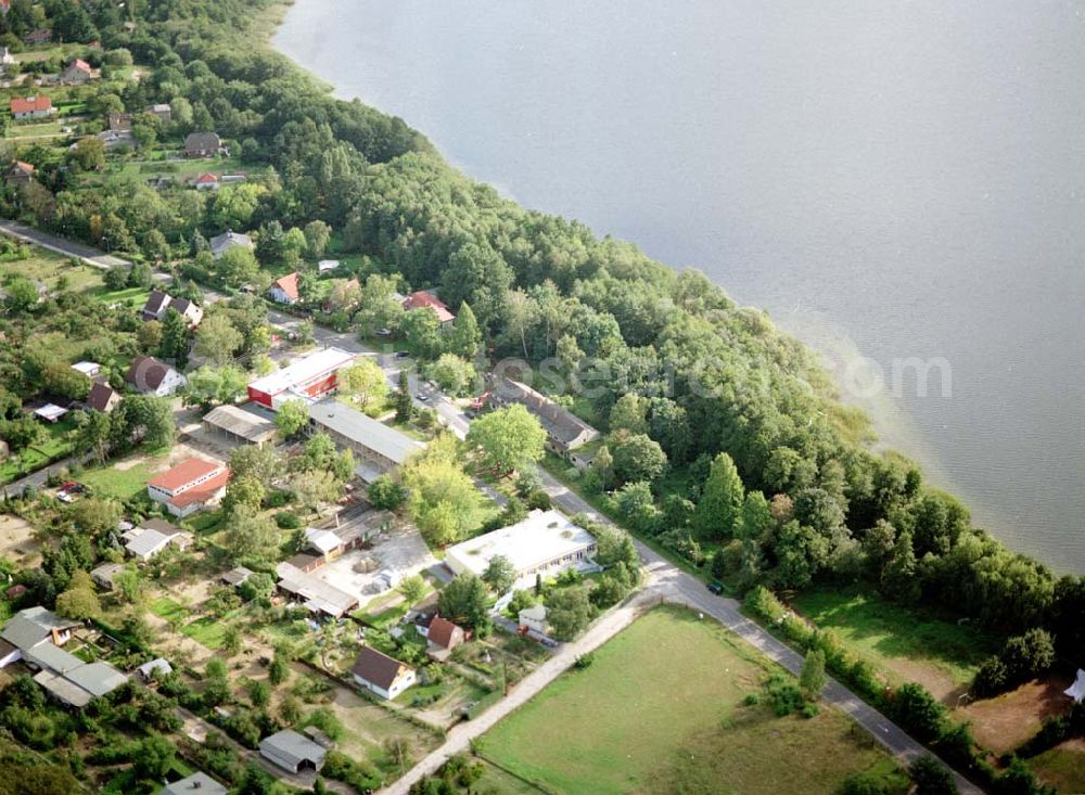 Werder / Brandenburg from the bird's eye view: Landstreifen der ADDIT Bau-Projekt GmbH & Co an der Kemnitzer Chaussee am Plessower See in Werder / Havel.