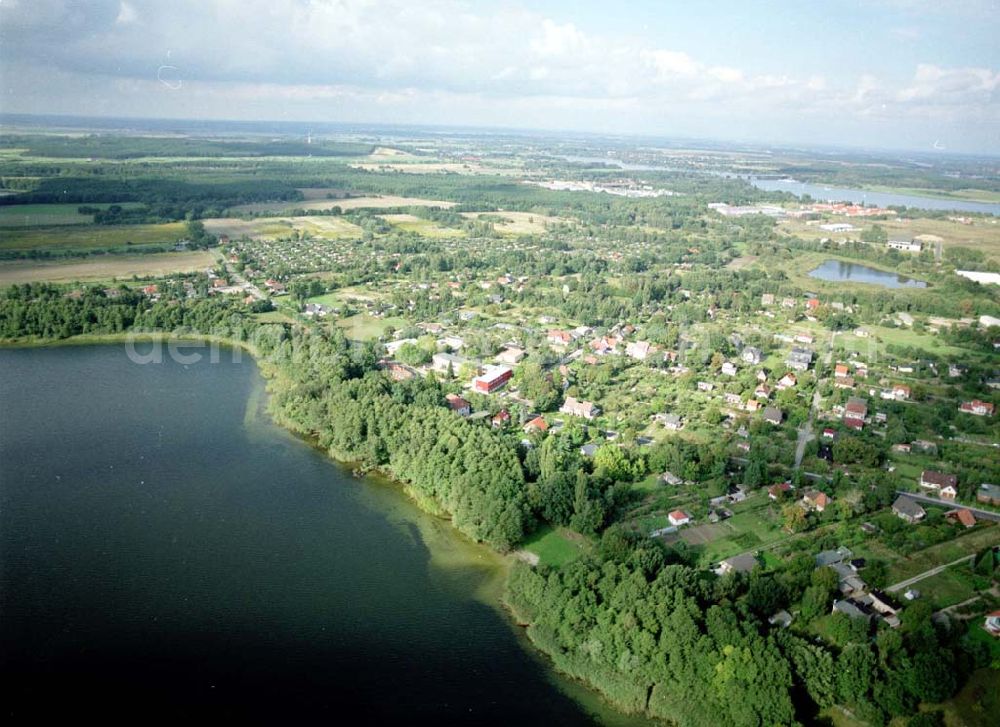 Werder / Brandenburg from the bird's eye view: Landstreifen der ADDIT Bau-Projekt GmbH & Co an der Kemnitzer Chaussee am Plessower See in Werder / Havel.