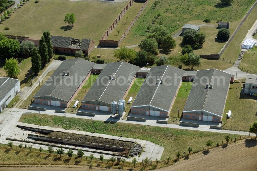 Lietzen from the bird's eye view: Agricultural buildings on a compound of the historic comman dery in Lietzen in the state of Brandenburg. The halls and agricultural facilities belong to the historic comman dery of the borough