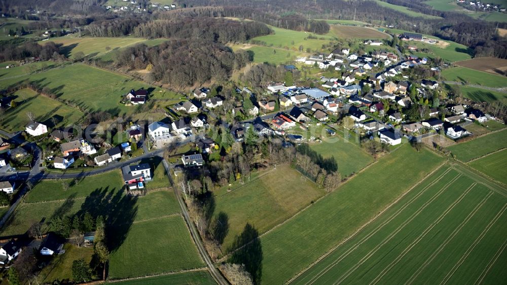 Aerial image Hennef (Sieg) - Agricultural areas and field boundaries surround the settlement area of the village in Kurscheid in Hennef (Sieg) in the state North Rhine-Westphalia, Germany